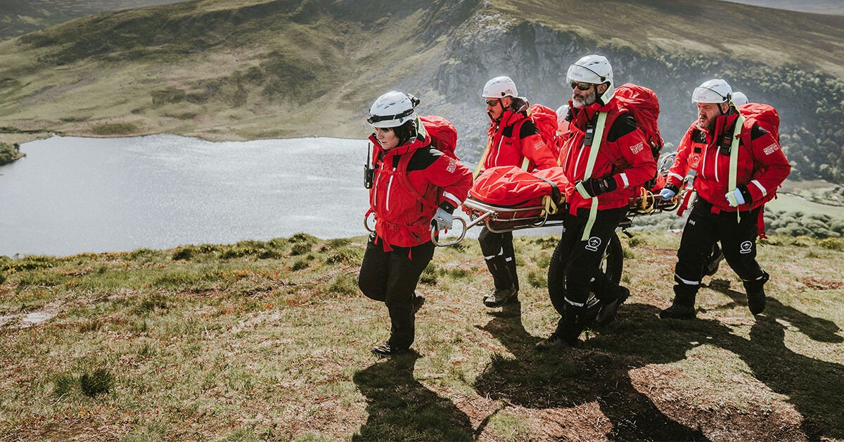 Search & Rescue team hiking in the mountains