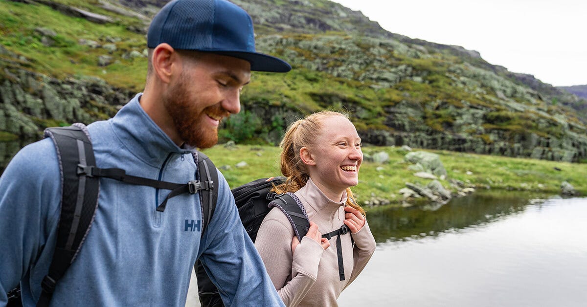 Two people hiking in the mountains