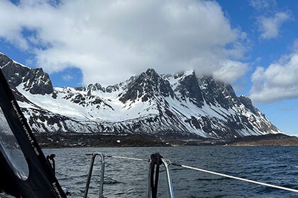 view towards the coast of Finnmark from a sailboat.