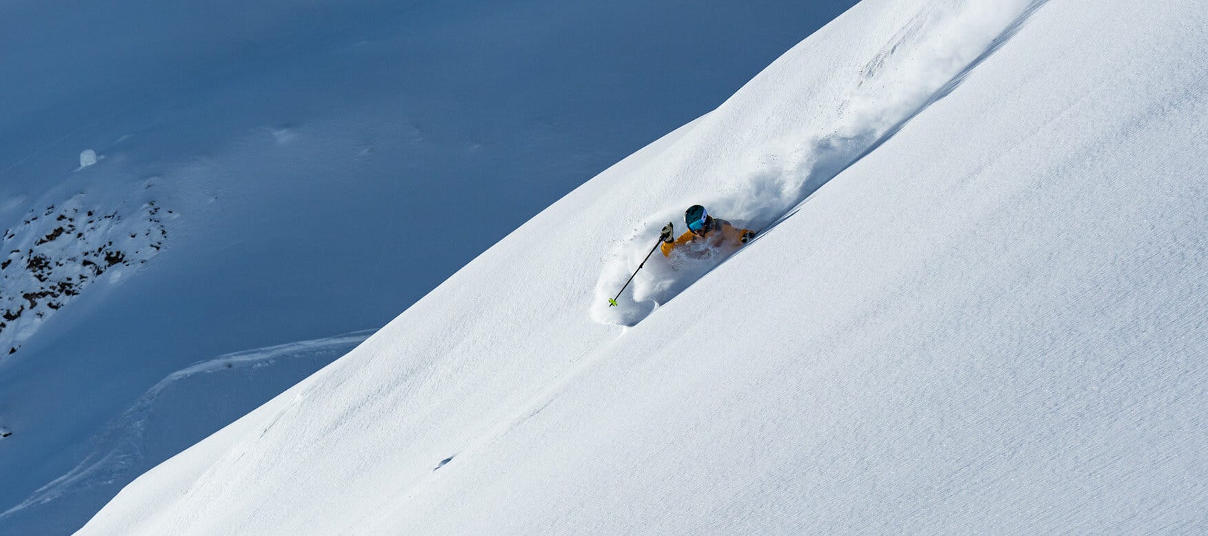 Marcus Caston skiing in deep powder
