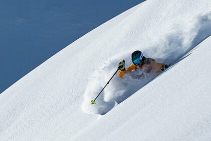 Marcus Caston skiing deep powder