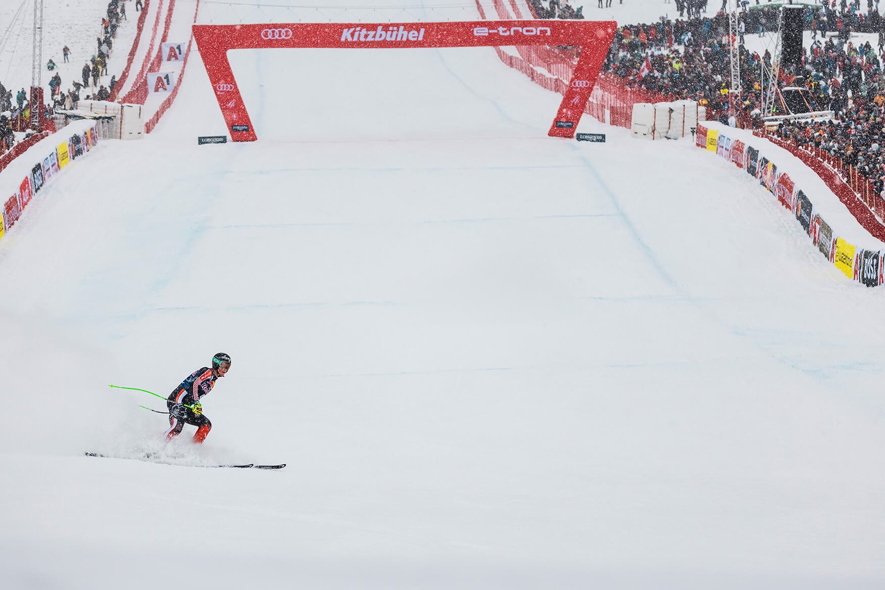 Downhill skier in the finish area of The Streif at Kitzbühel