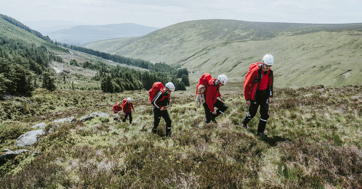 Search & Rescue team hiking in the mountains